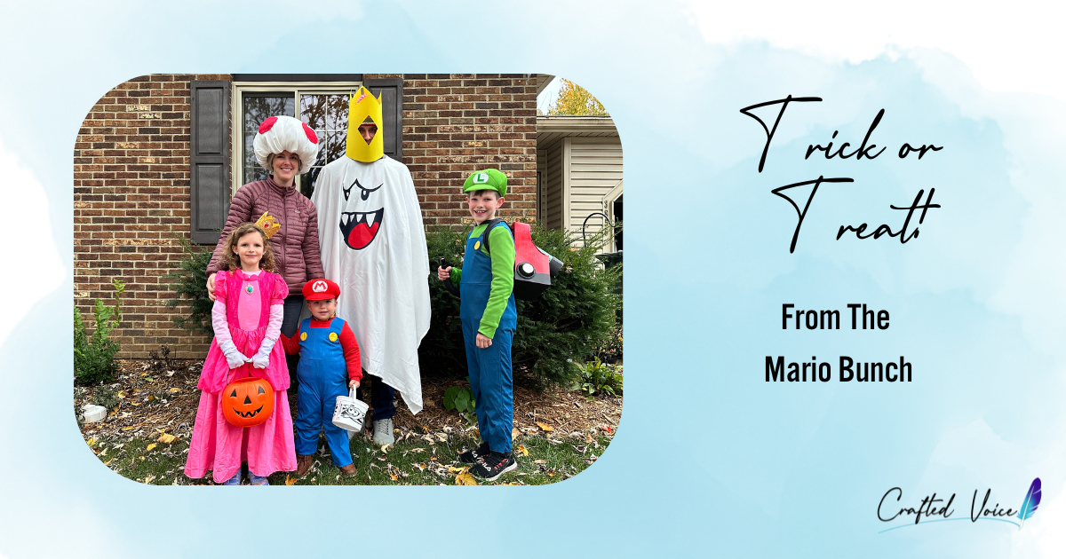 Trick or treat! From the Mario Bunch. A photo of a family of 5 dressed in Mario costumes: Princess Peach, Toad, King Boo, Mario, and Luigi